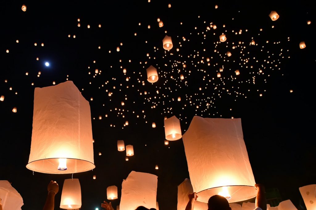 Floating lanterns on sky in Loy Krathong Festival
